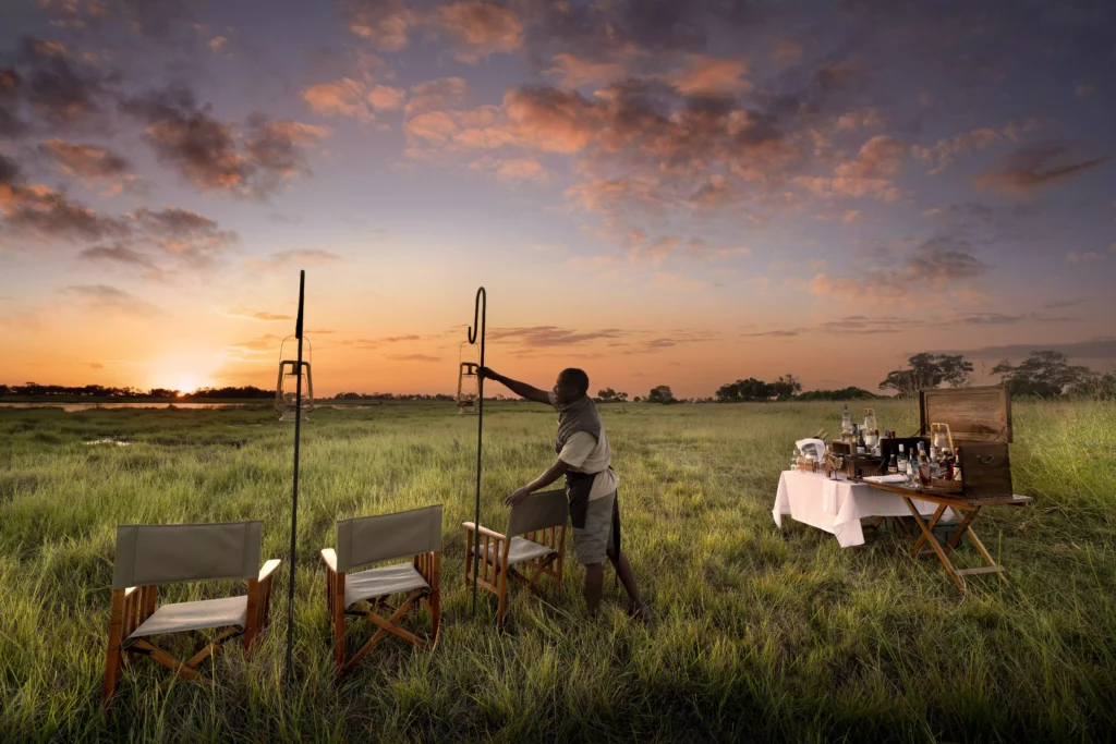 Setting up a romantic dinner in the bush