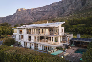Front view of Atzaró Cape Town luxury hotel with Table Mountain in the background.