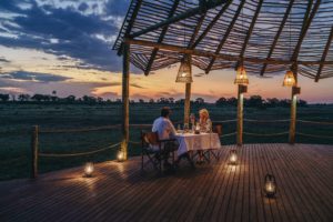 Atzaró Okavango Camp dining under the Delta sky.